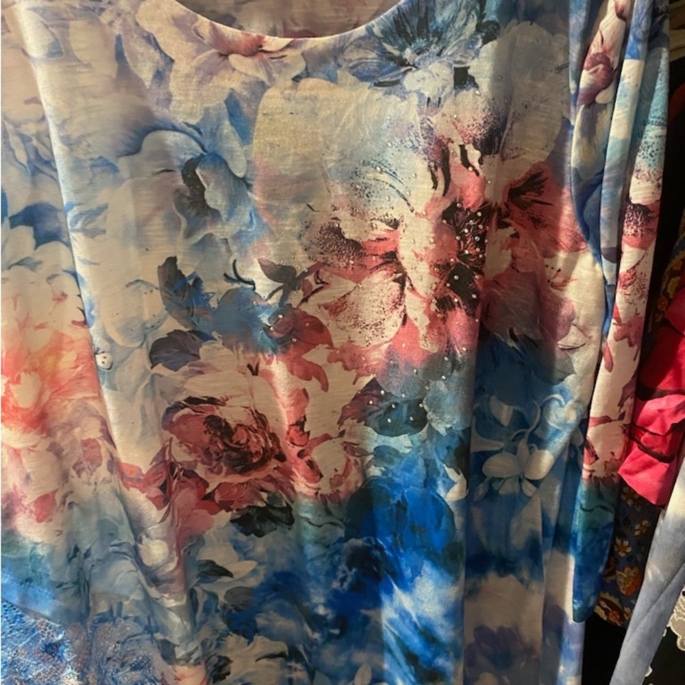 Long sleeve Tee like dressy shirt. Never worn